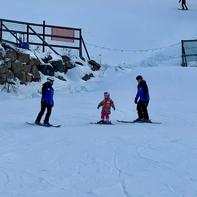 Deborah skiing with coach
