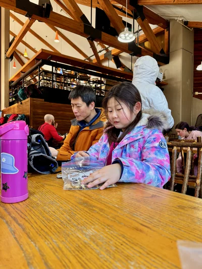 Lin and Elizabeth snacktime at lodge